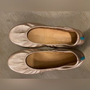 Gently worn pair of rosè tieks size 10